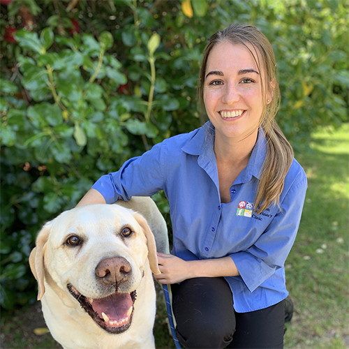 Dr Melody Woman hugging a dog